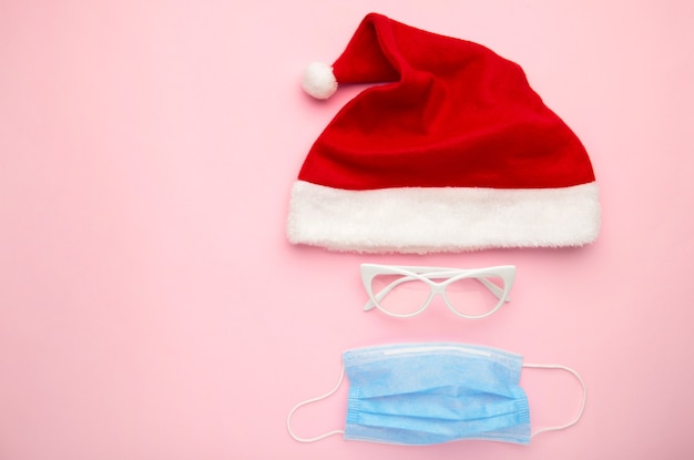 Top view Christmas hat with face mask