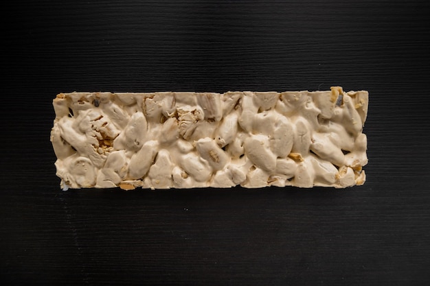 Top view of Christmas Turron over black background