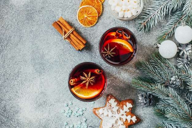 Top view on Christmas wooden grey table hot alcoholic drink mulled wine