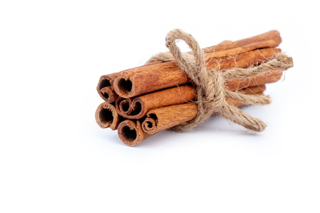 Top view cinnamon sticks isolated on white background.
