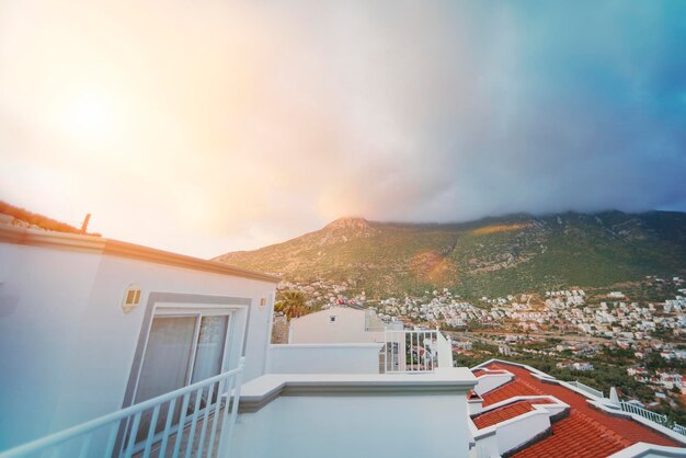 Top view of the city in the mountains in the sunlight