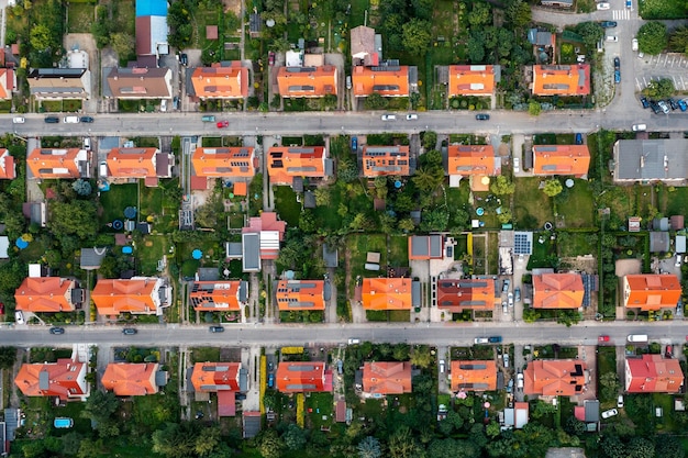 Top view of the city streets red roofs of houses urban landscape