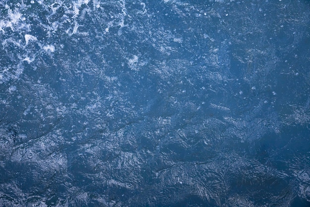 Foto vista dall'alto sfondo chiaro di struttura dell'acqua dell'oceano