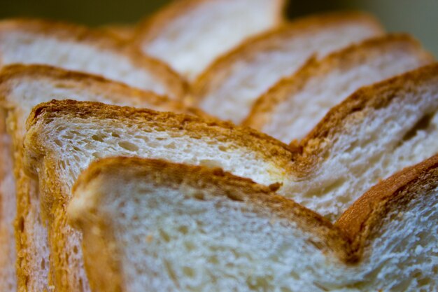 Top view close up pieces of sliced  wholegrain bread   