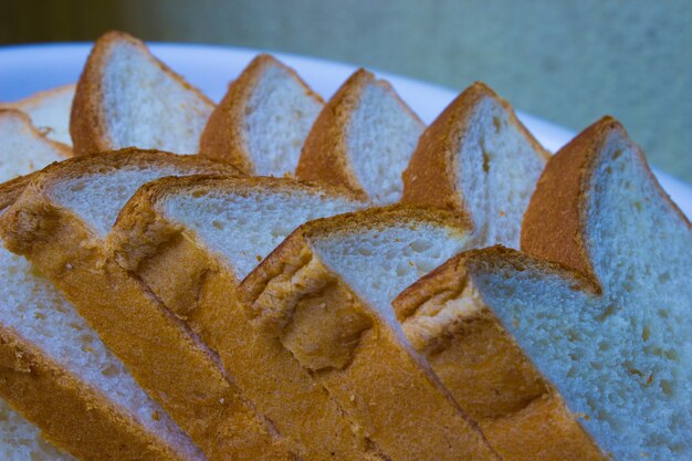 Top view close up pieces of sliced  wholegrain bread   