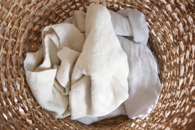 Top view of clothes in basket on floor