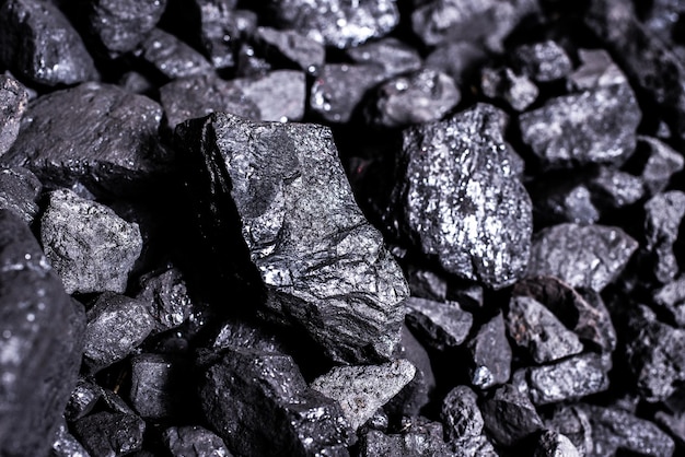 Photo top view of a coal mine mineral black for background. used as fuel for industrial coke.