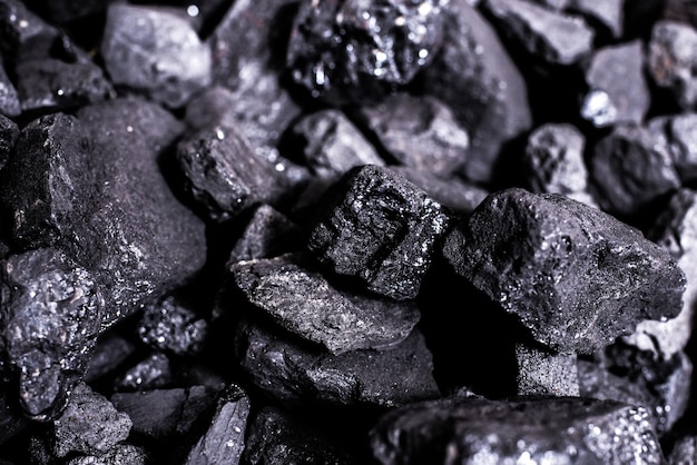 Top view of a coal mine mineral black for background. Used as fuel for industrial coke.