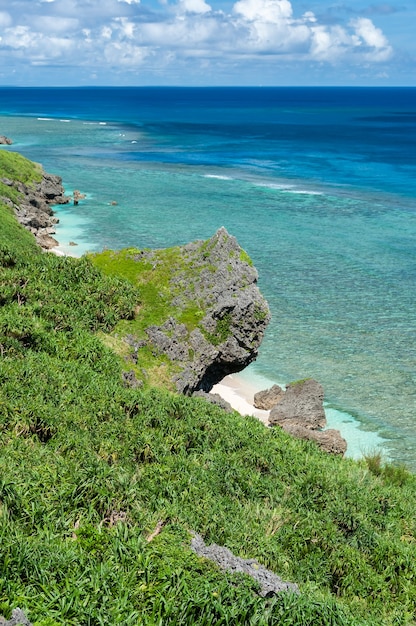 Top view of coastline with green vegetation small beaches and a stunning blue sea Yonaguni Island