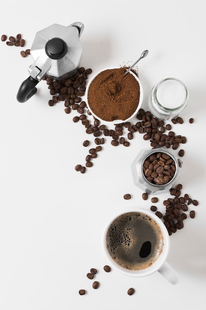 Top view coffee grinder with fresh hot beverages