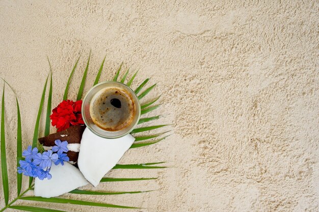 Top view coffee with coconut on the beach