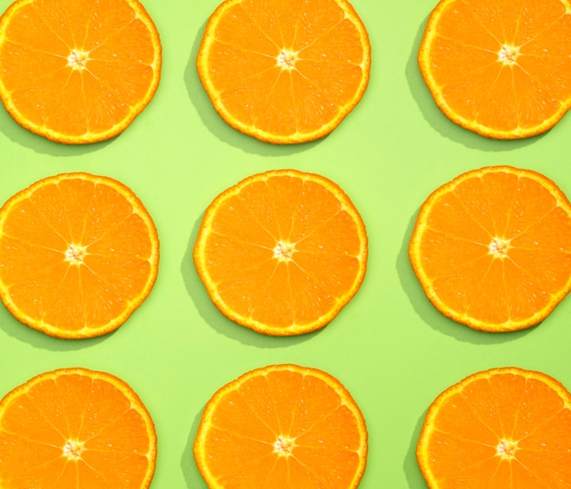 Photo top view collection of organic orange slices