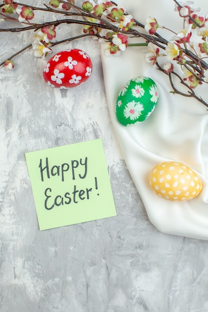 top view colored easter eggs on white surface