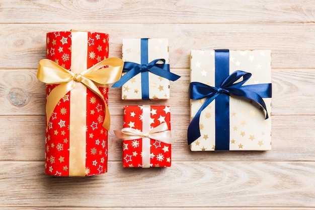 Top view of a colored gift box on colorful background holiday concept