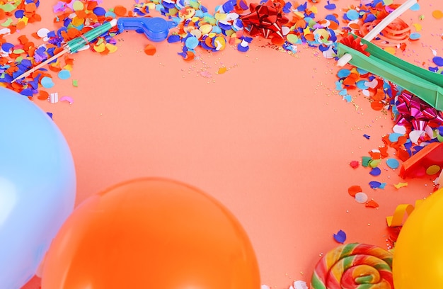 Top view of colorful party confetti background with place for text