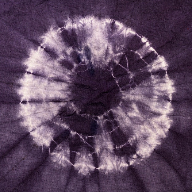 Photo top view of colorful tie-dye fabric