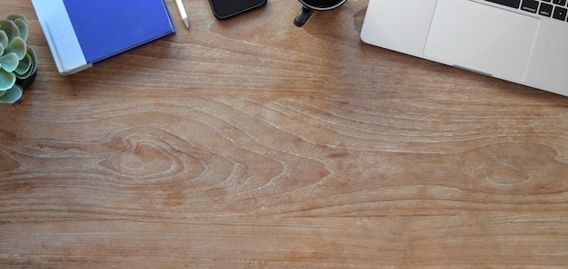 Top view of comfortable workplace with office supplies and copy space