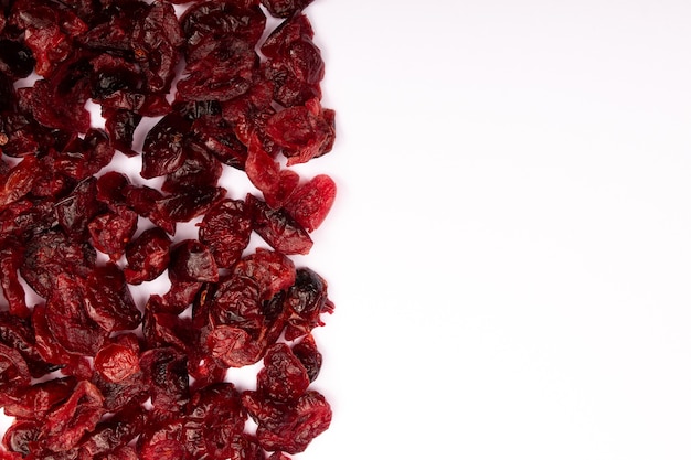 Top view composition of healthy organic dried red cranberries