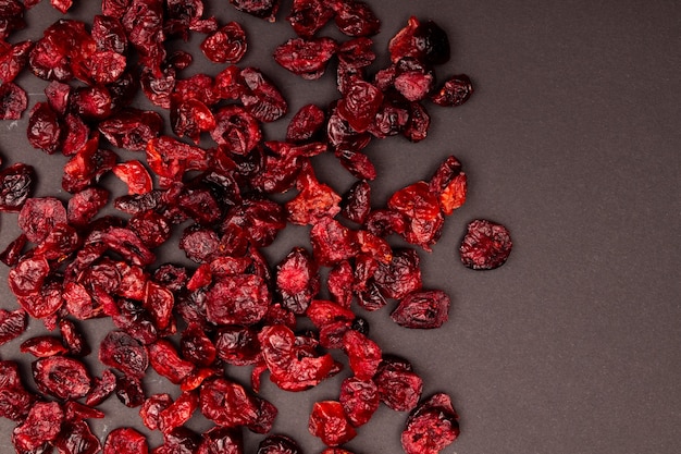 Top view composition of healthy organic dried red cranberries