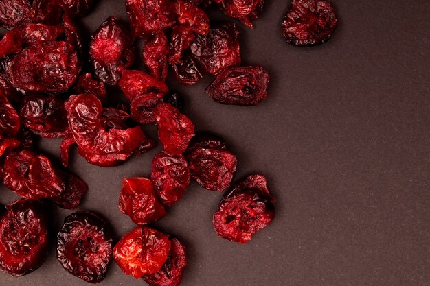 Top view composition of healthy organic dried red cranberries