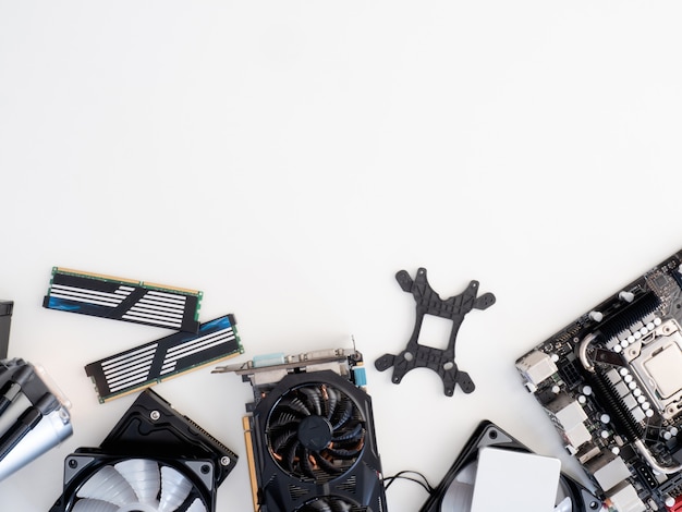 top view of computer parts with harddisk, solid state drive, ram, CPU, graphics card, liquid cooling and motherboard