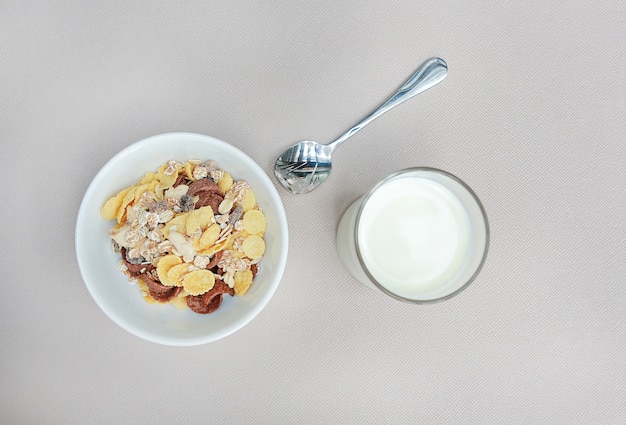 Top view Cornflakes cereal and milk in a bowl