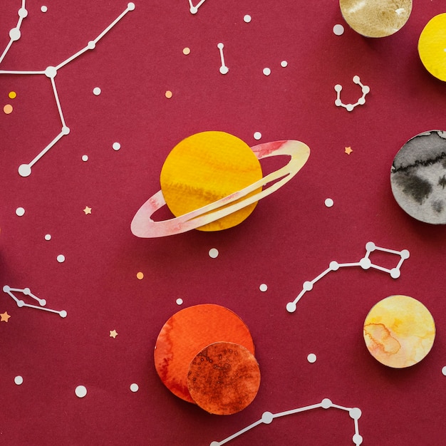 Photo top view creative paper planets composition