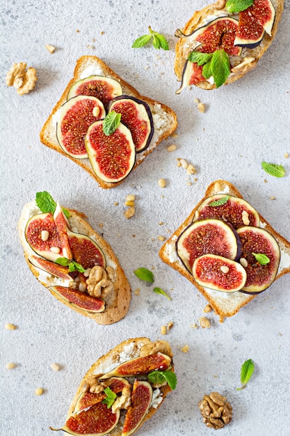 Top view of Crispy bruschetta with soft ricotta and figs