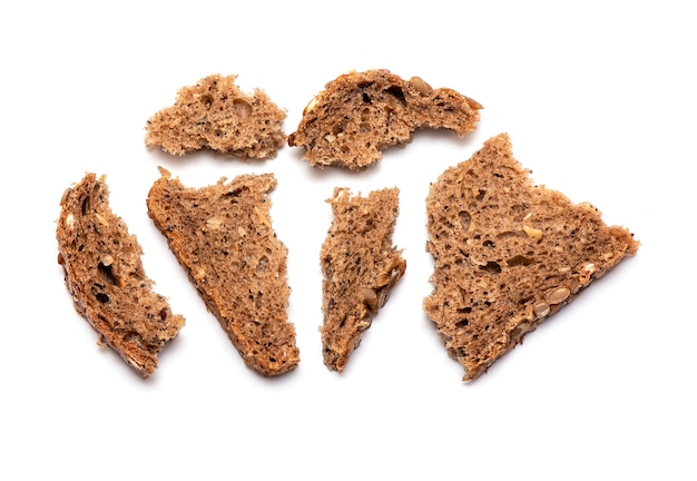 Top view of crumbled multi Grain brown Bread isolated