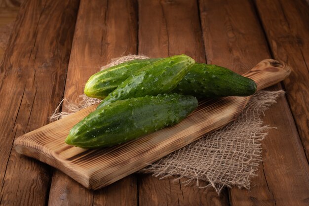 top view cucumber on wooden board