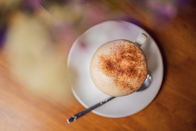 Top view a cup of giang egg coffee on wood background vietnamese coffee in ha noi vietnam eggs are