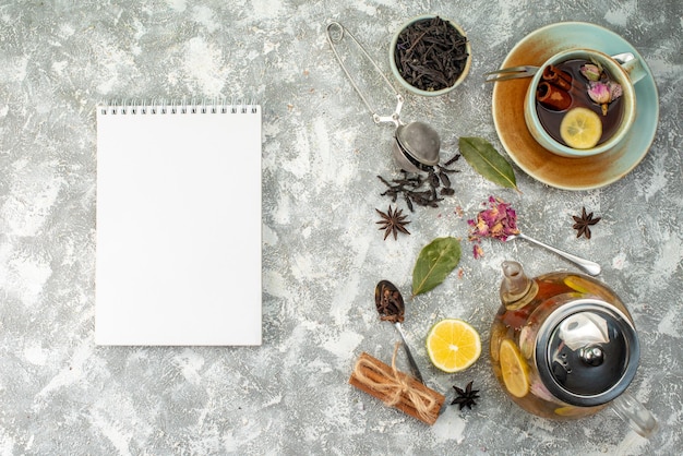 Top view cup of tea with lemon on the light background breakfast flower ceremony flavor fruit food color morning