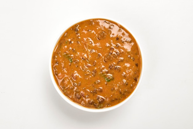 Top view of dal makhani in Bowl isolated on white background