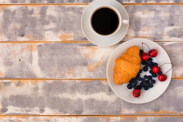 Top view of a delicious breakfast with croissants