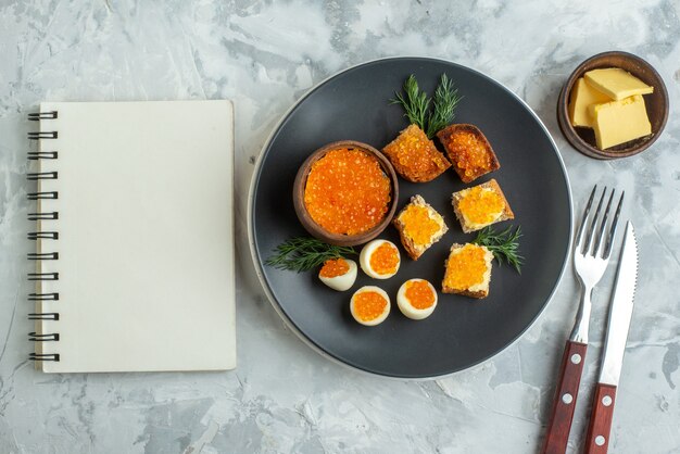 top view delicious caviar sandwiches with boiled eggs inside plate white background dinner seafood breakfast bread fish toast meal lunch