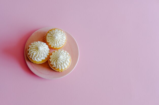 Top view of delicious cupcakes