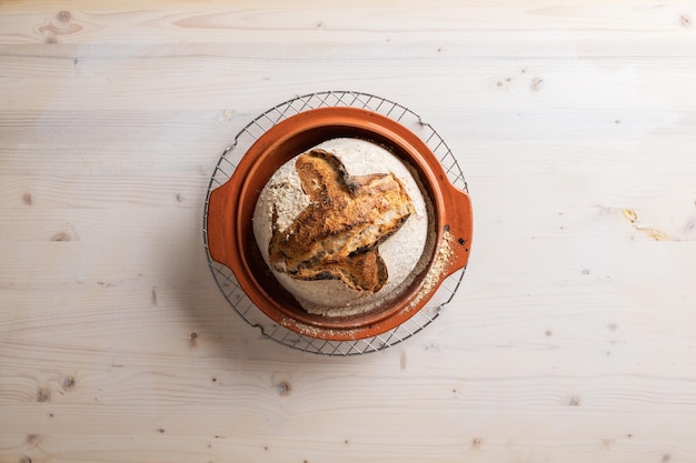 Top view of delicious organic homemade sourdough bread freshly baked