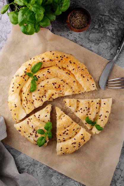 Photo top view delicious pastry with herbs