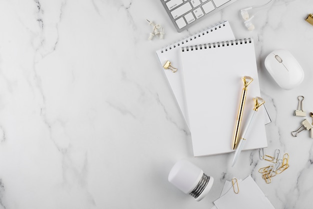 Top view desk elements on marble table