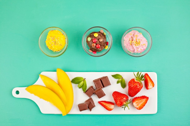 Top view of different ice cream with the ingredients