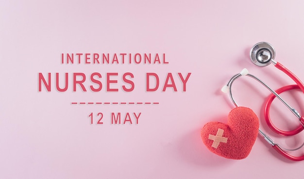 Photo top view of doctor stethoscope and red heart on pastel background international nurse day and medical concept