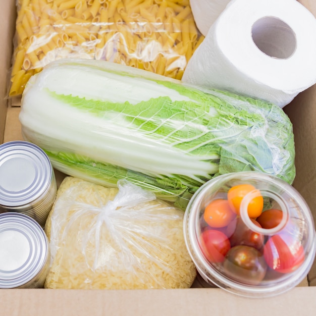 Top view of donation box. Food supplies for quarantine isolation period.