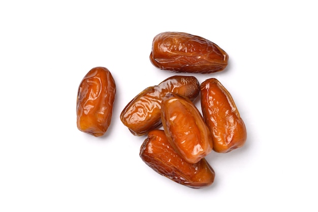 Top view of dried Date palm fruits isolate