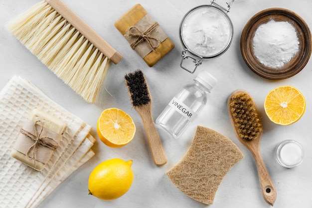 Photo top view of eco cleaning products and brushes