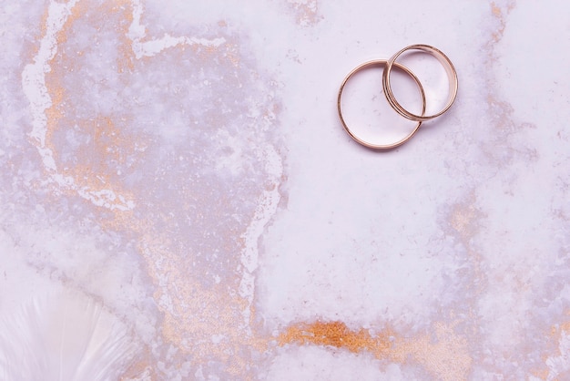 Top view elegant wedding rings on the table