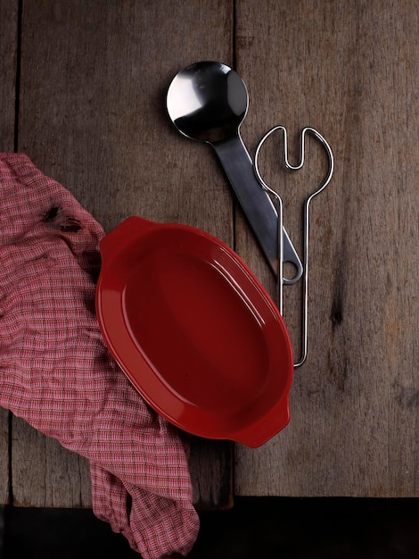 Top View Empty Red Dish Oval Casserole on Wooden Table