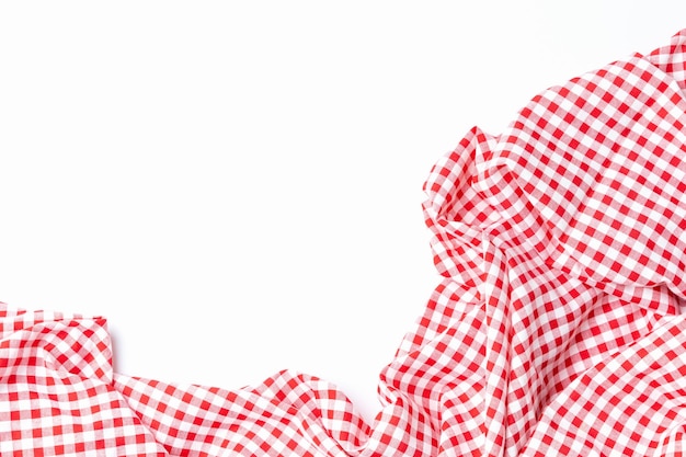 Top view fabric red and white checkered isolated on a white background with copy space Cloth cotton