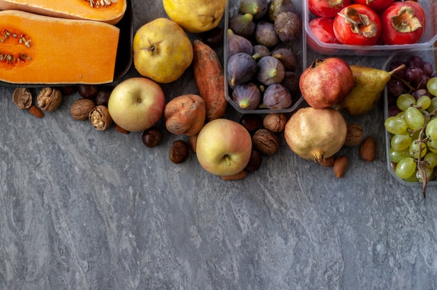 Top view to fall fruits with copy space.