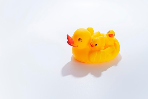 Top view of family of yellow toy ducklings