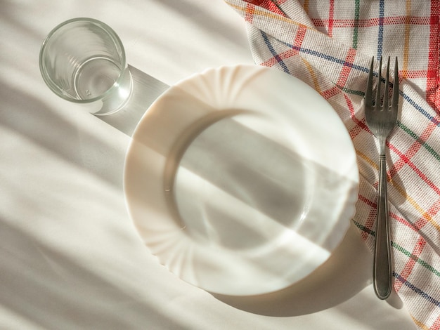 Top view of the festive table setting with beautiful shadows